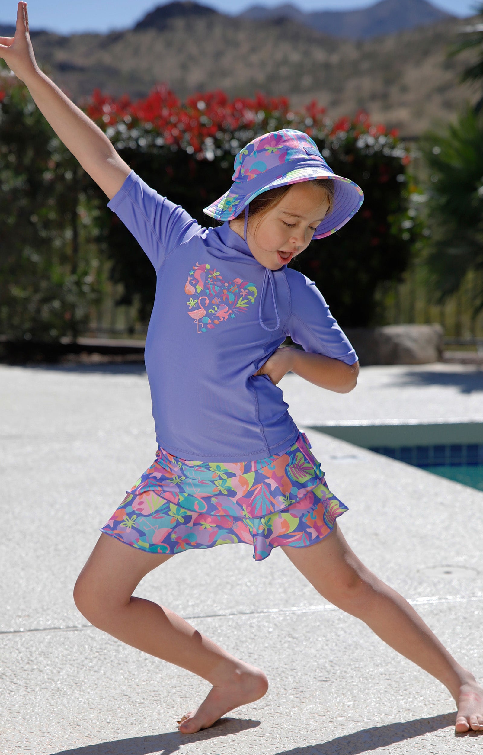 girl dancing by pool in girls sunny swim skirt|hidden-friends