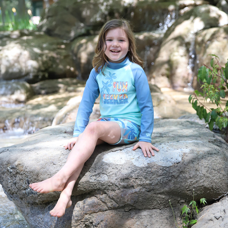 girl on rock in kids long sleeve sun & Swim shirt|fun-seeker