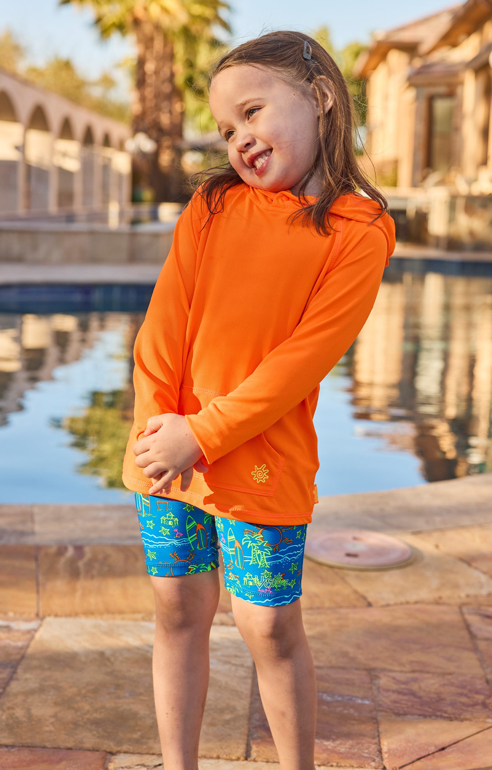 girl by pool in neon upf pullover hoodie|neon-orange