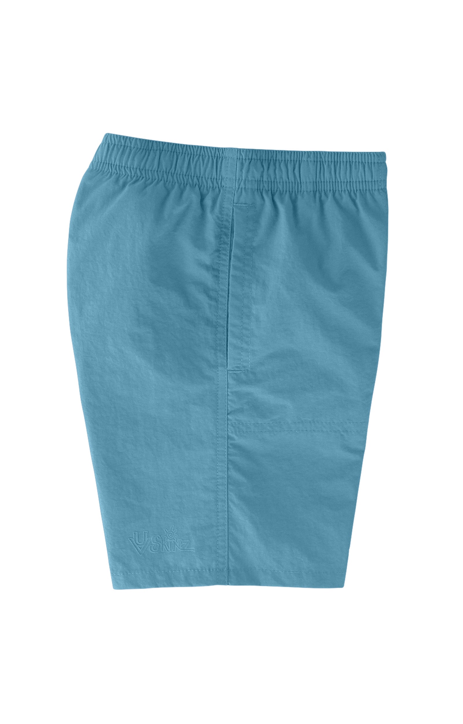 side view of the boys beach shorts in lagoon|lagoon