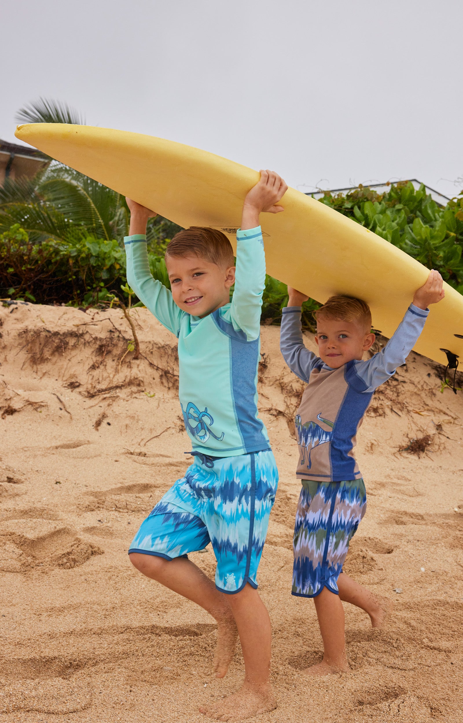 boys carrying surfboards in long sleeve active sun & Swim shirts|roar-ready