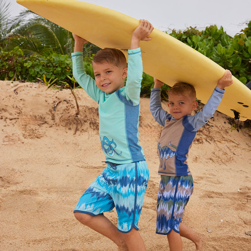 boys carrying surfboards in long sleeve active sun & Swim shirts|tentacle-twist