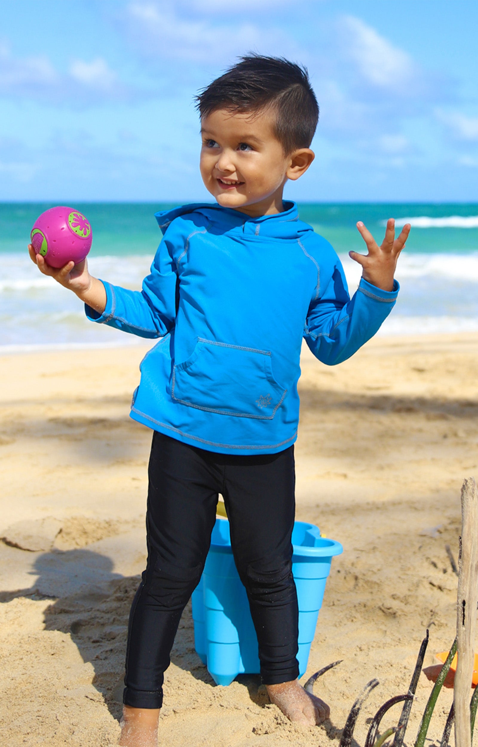 Little boy in UV Skinz's boy's pullover hoodie in royal|royal
