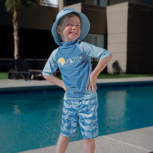 boy by the pool in adjustable bucket hat|aquamarine