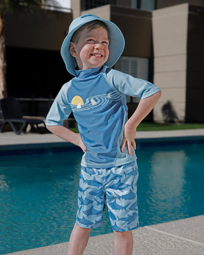 boy by the pool in adjustable bucket hat|aquamarine
