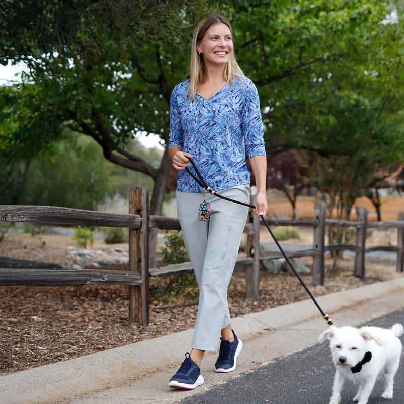 woman walking dog in walking capris in agave|agave