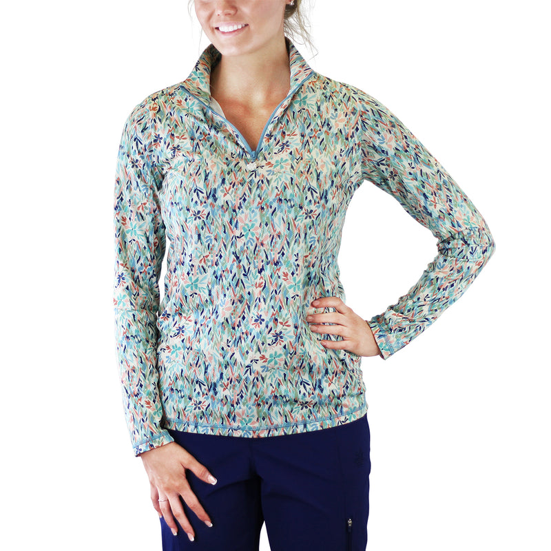 Woman in UV Skinz's Women's Quarter Zip Vented Sun Shirt in Painted Eden|painted-eden