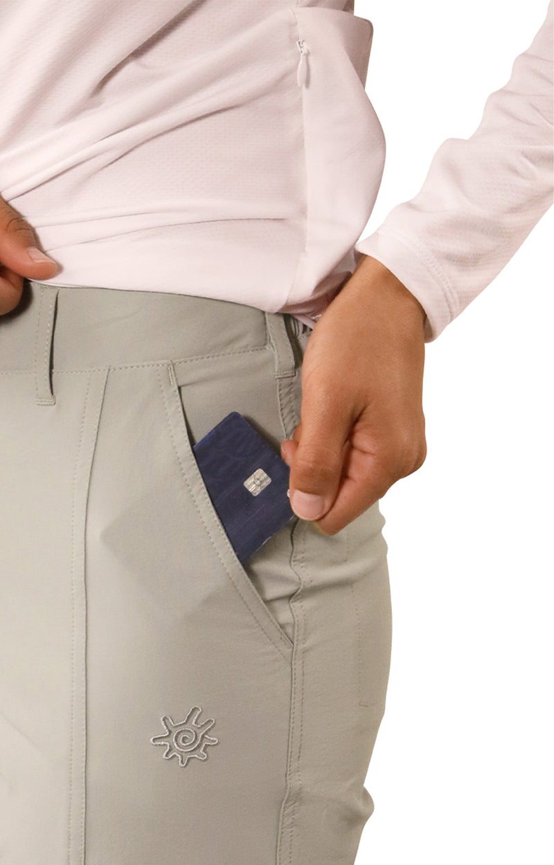 close up of pocket of woman in walking capris in agave|agave