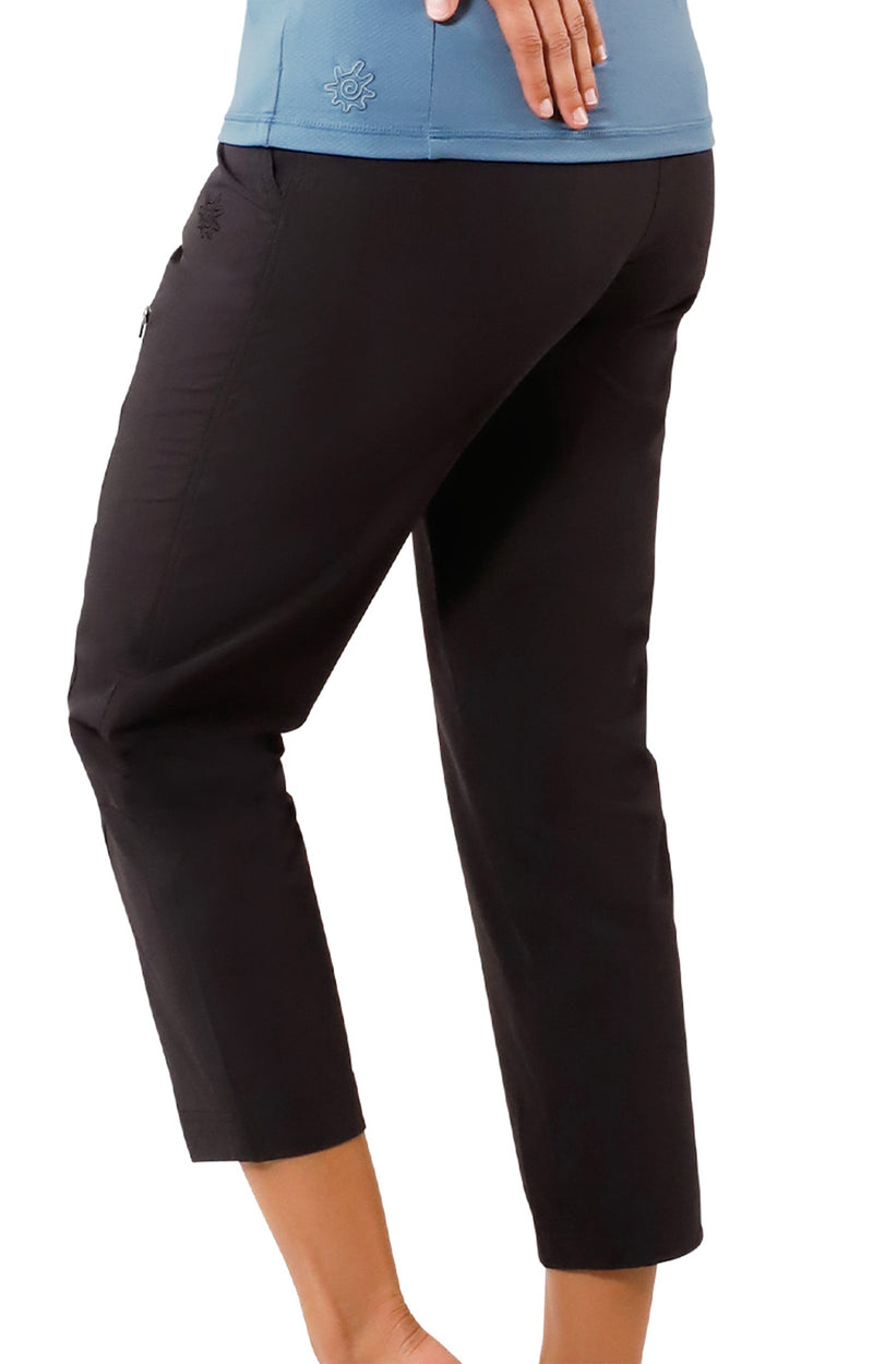 side view of woman in walking capris in black|black