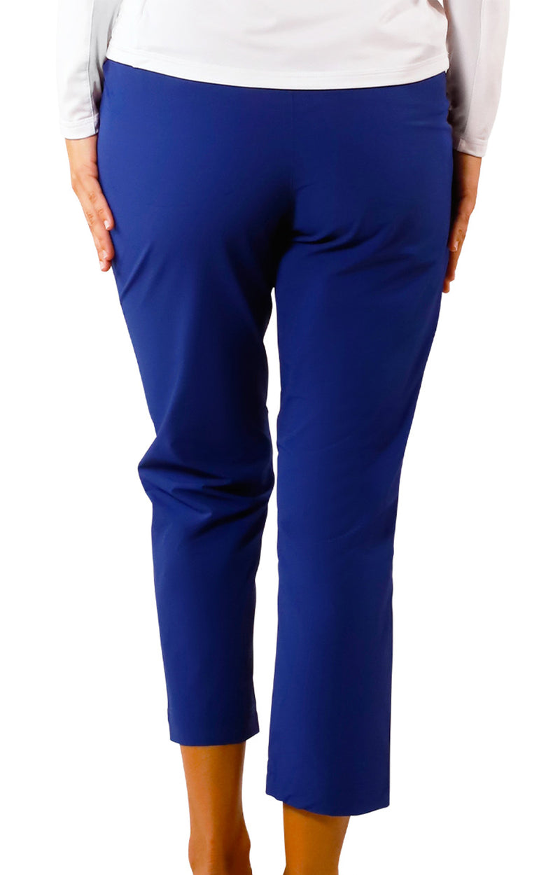 back view of woman in walking capris in dark navy|dark-navy
