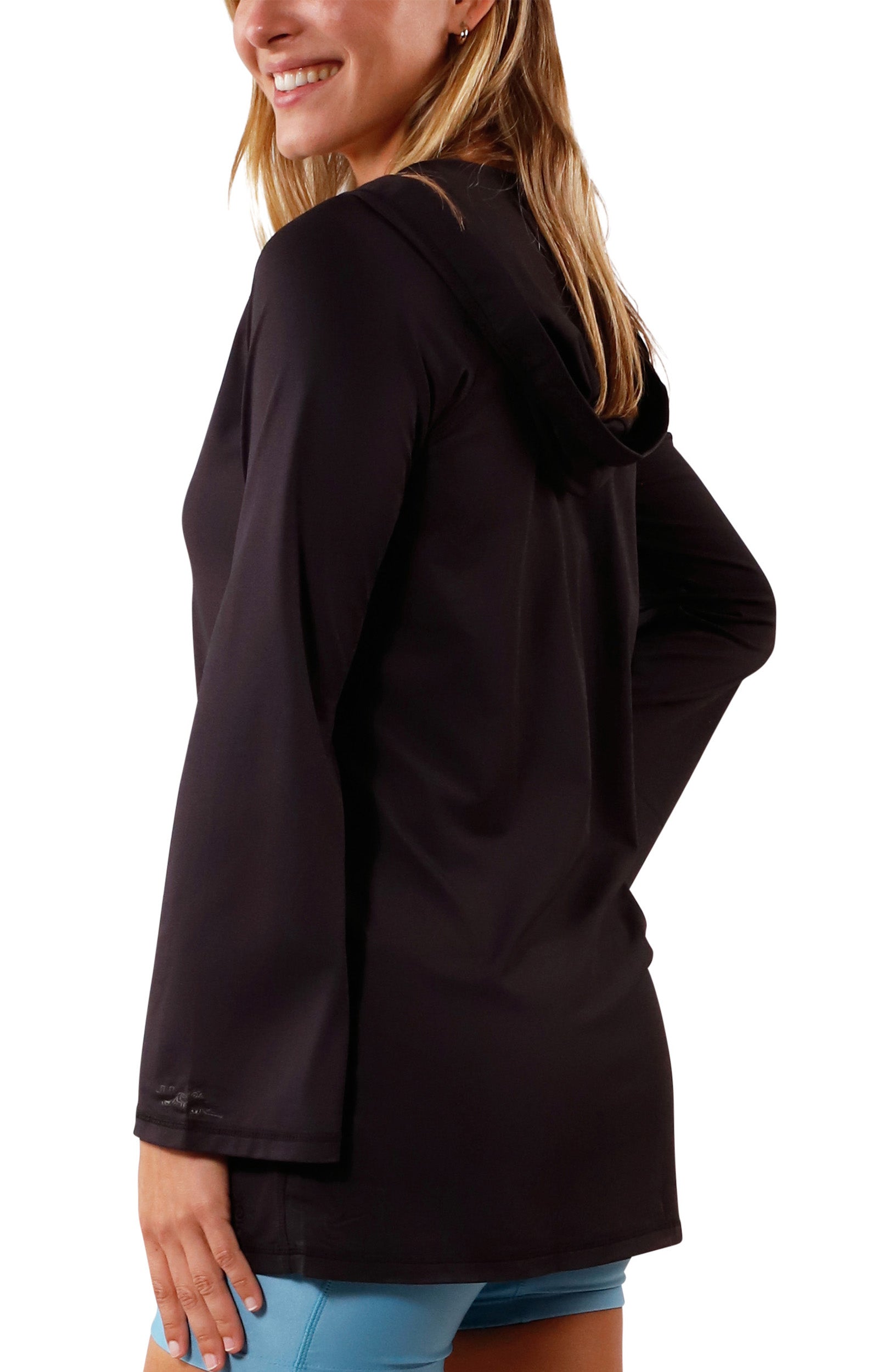 side view of Woman in UV Skinz's Women's Hooded Beach Cover Up|black