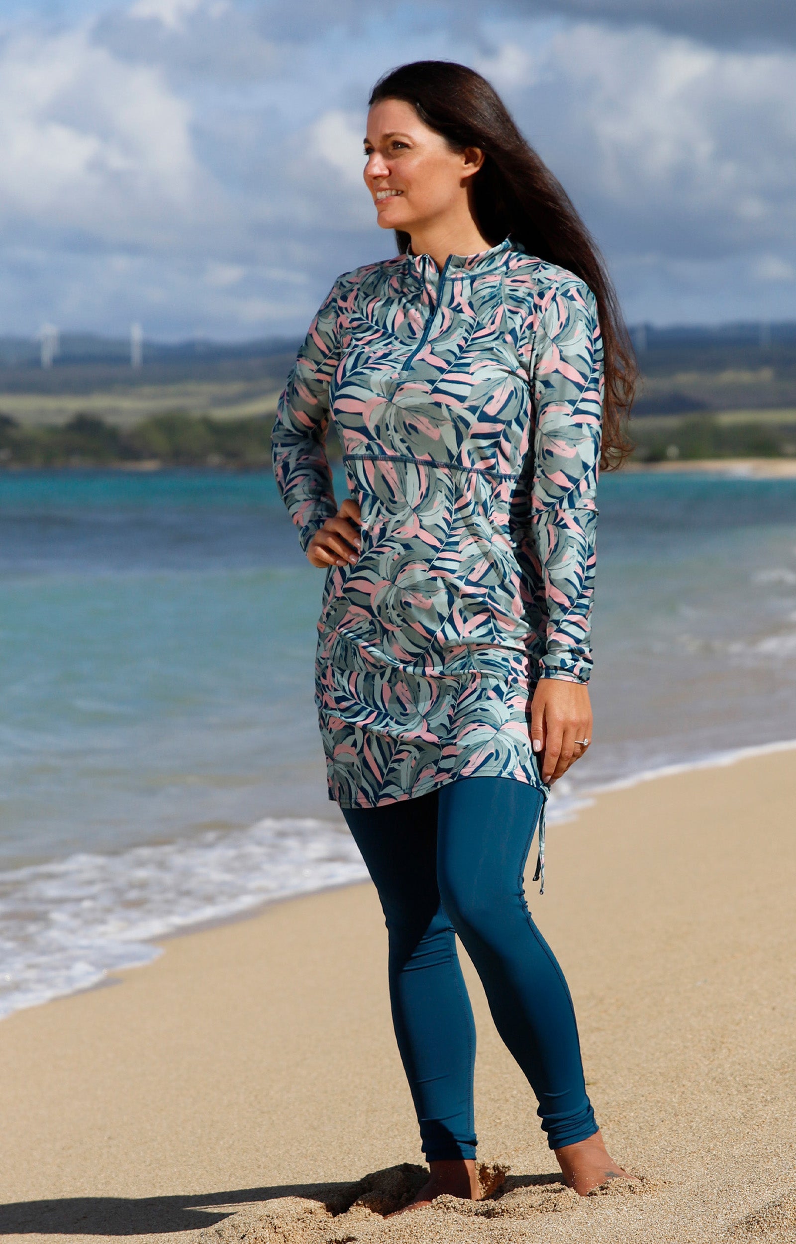 woman posing by the beach in women's convertible swim shirtdress in moonlit canopy|moonlit-canopy