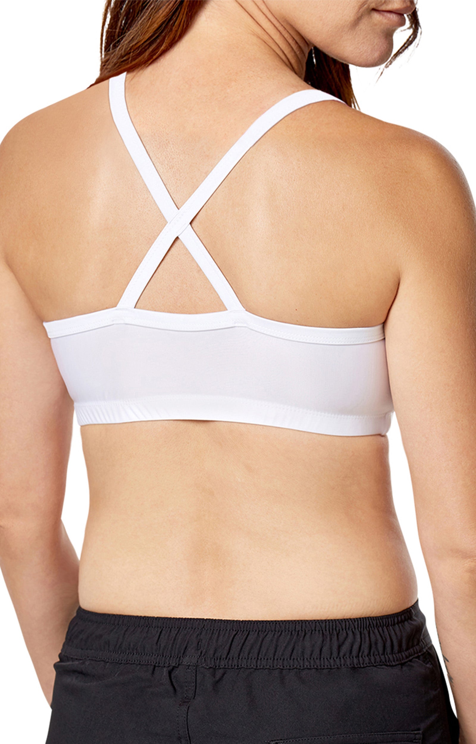Back view of a woman wearing UV Skinz's swim bra in white|white
