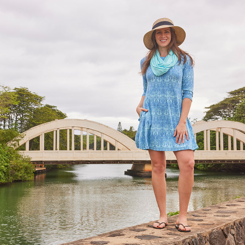 woman by the river in swing dress|baltic-kaleidoscope