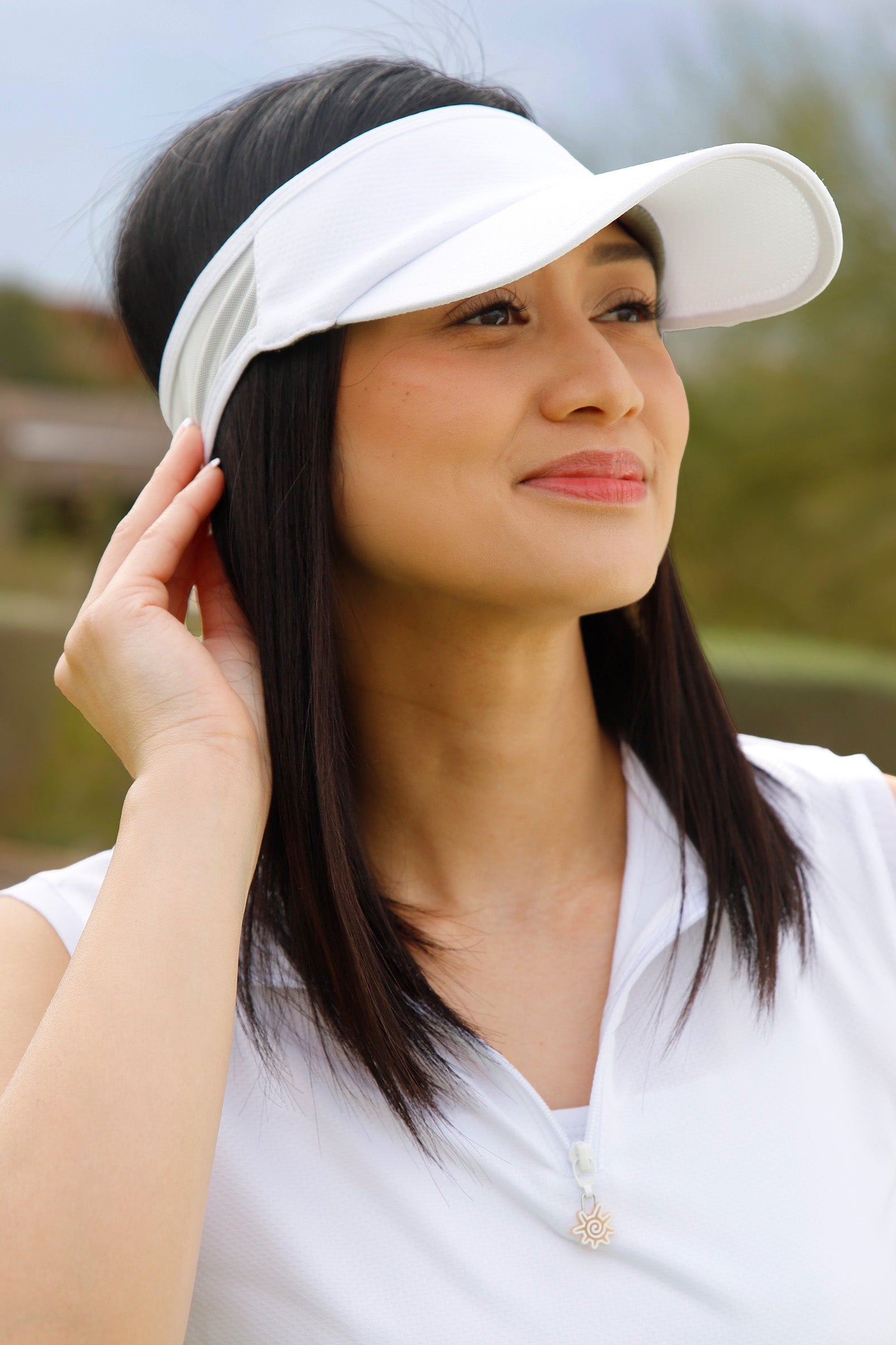 woman wearing womens active sun visor|white