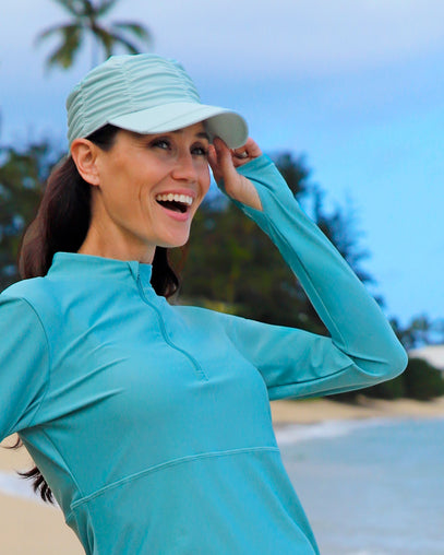 woman in ruched sun cap|dewdrop