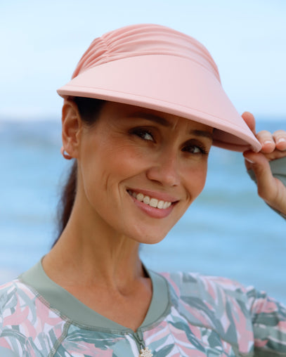 woman in dusty pink swim visor|dusty-pink