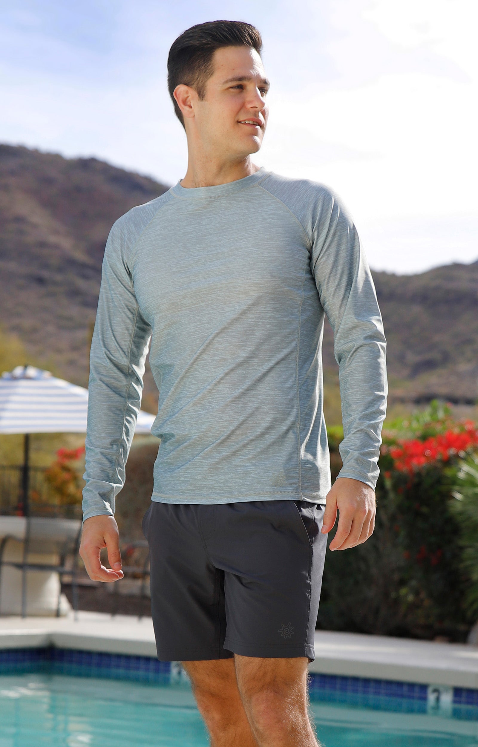 man by the pool wearing mens long sleeve crew sun & swim shirt|agave-jaspe