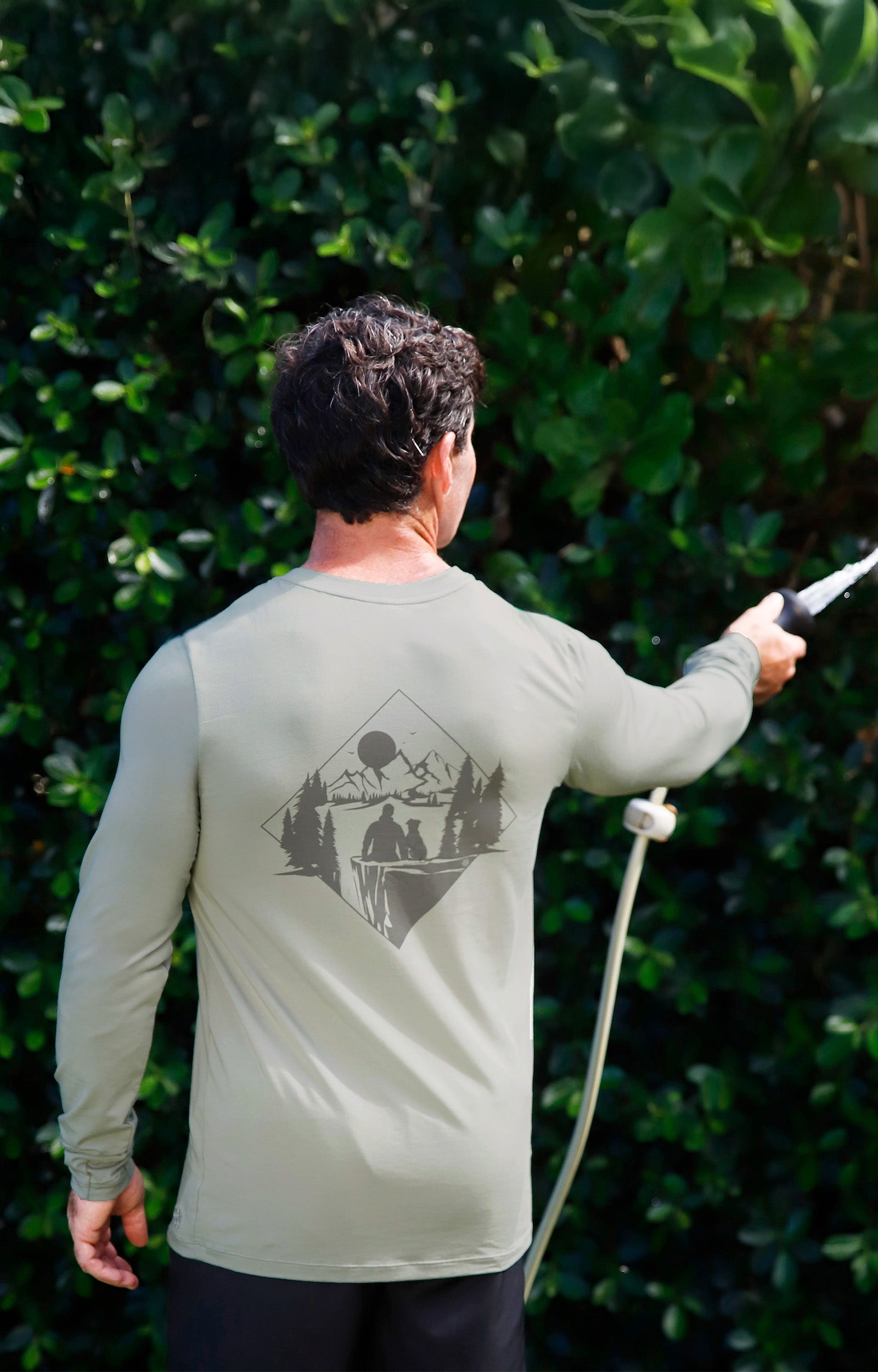 man watering his garden in men's long sleeve everyday tee|agave