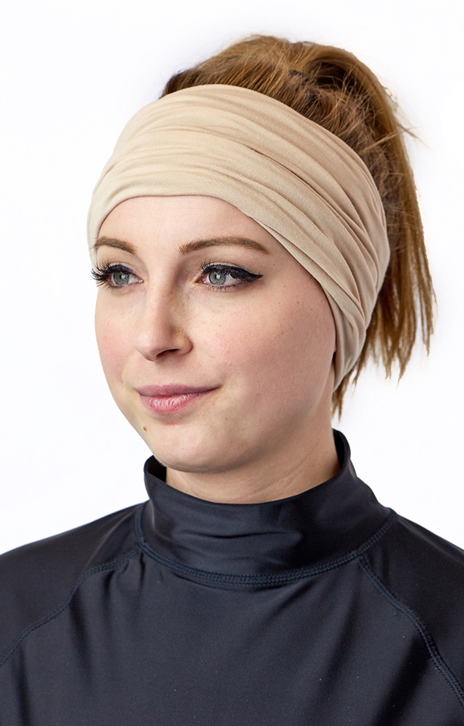 Woman Wearing UV Skinz's Bamboo UV Neck and Face Covering in Sand as a Headband|sand