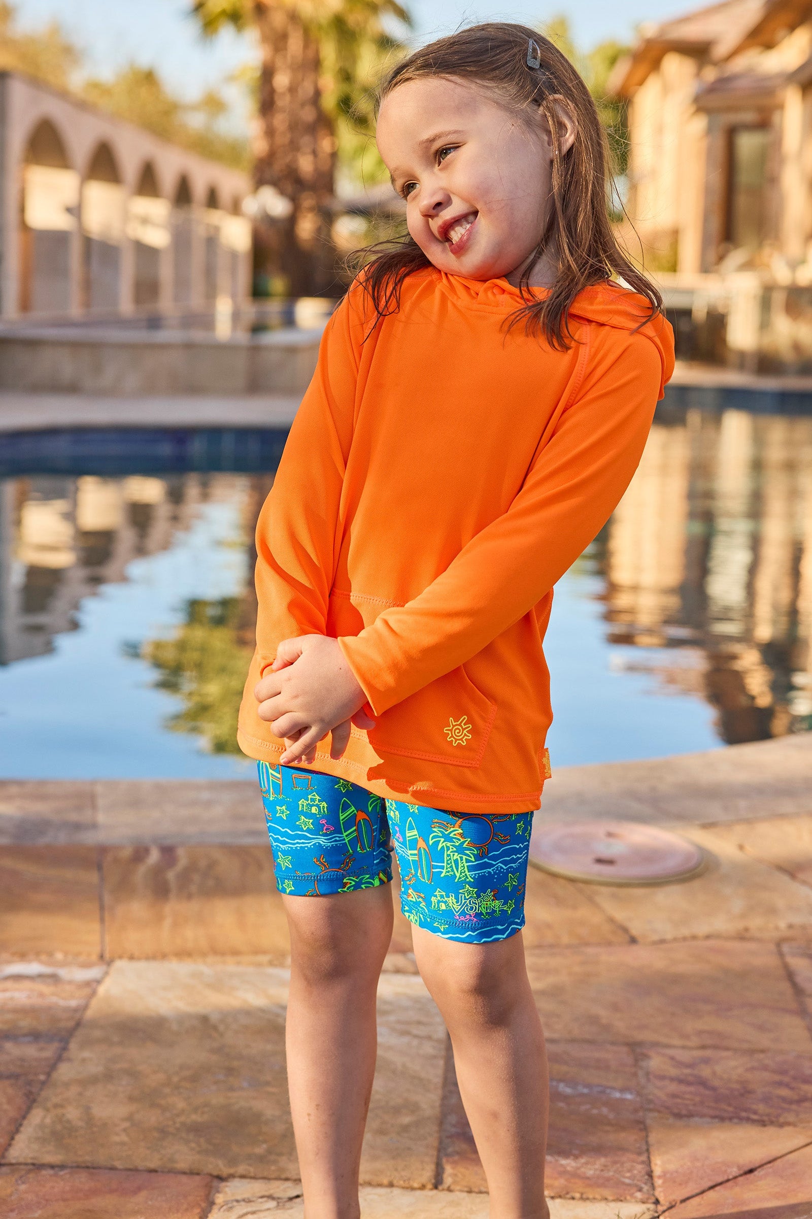 girl by pool in jammerz|neon-beach