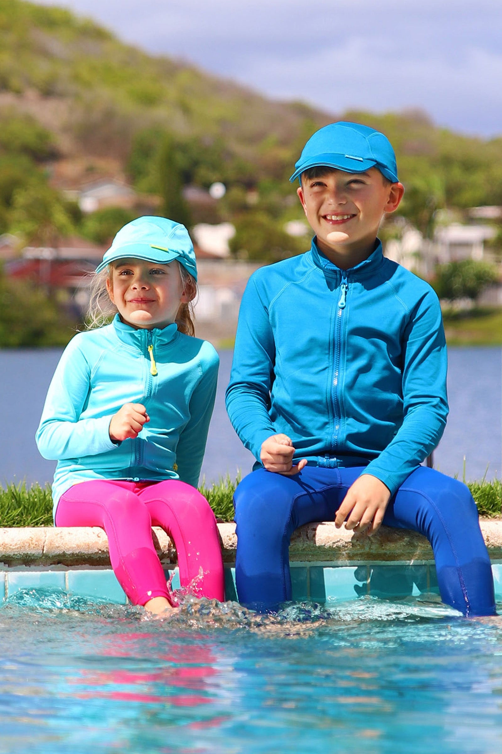 Brother and Sister in UV Skinz's Kid's Active Fleece Hats|black