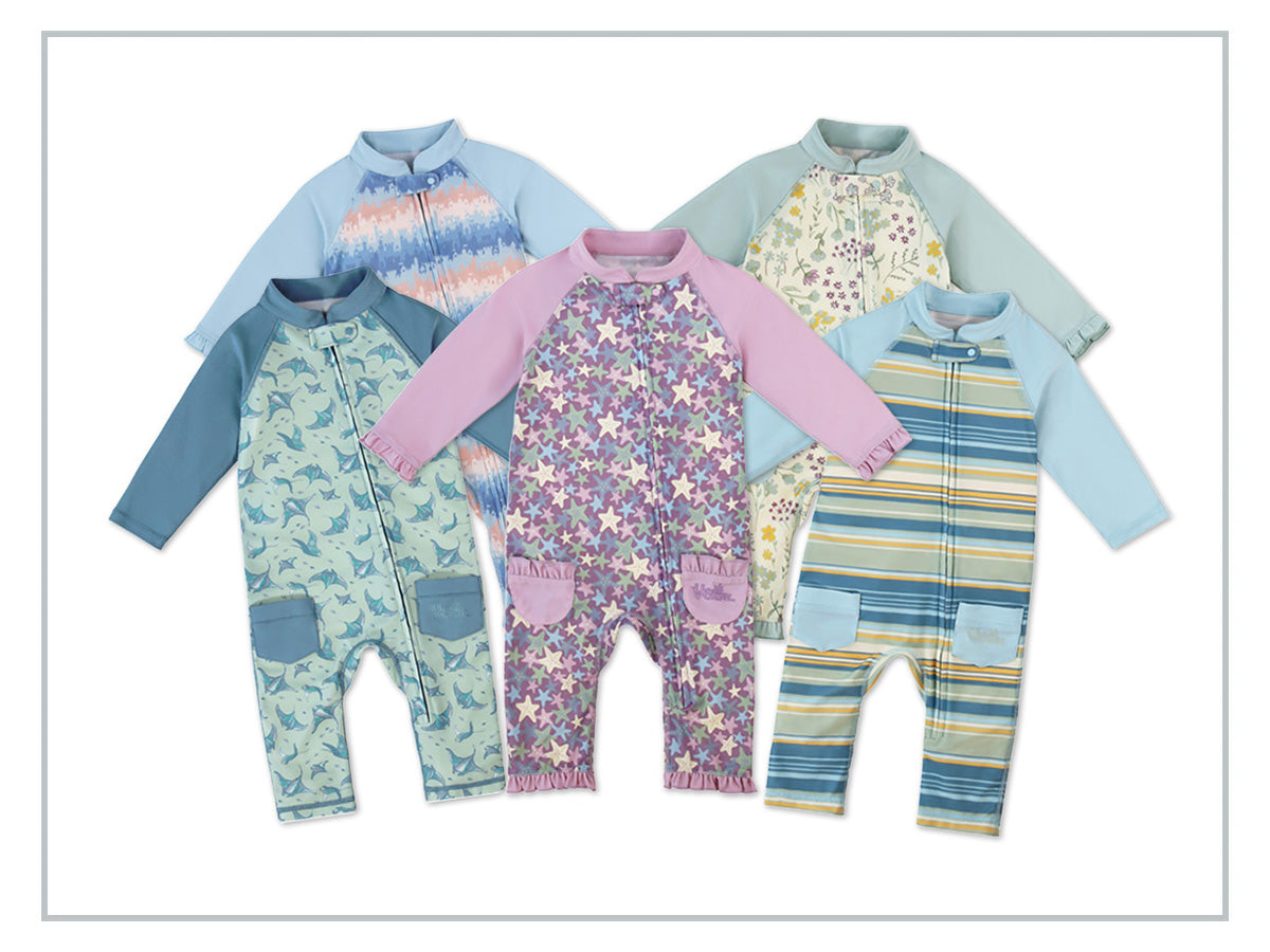 Baby in soft, protective UV Skinz clothing