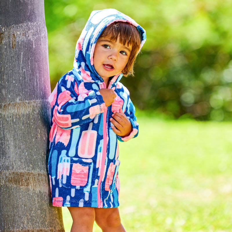 Little girl in the Baby Girl's Hooded Terry Beach Cover-Up in Popsicles|popsicles