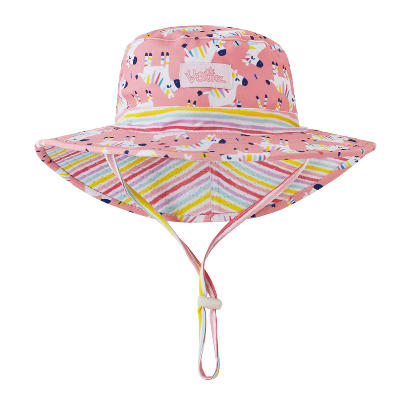 Close up of the baby girl's swim hat in rainbow zebra|rainbow-zebra