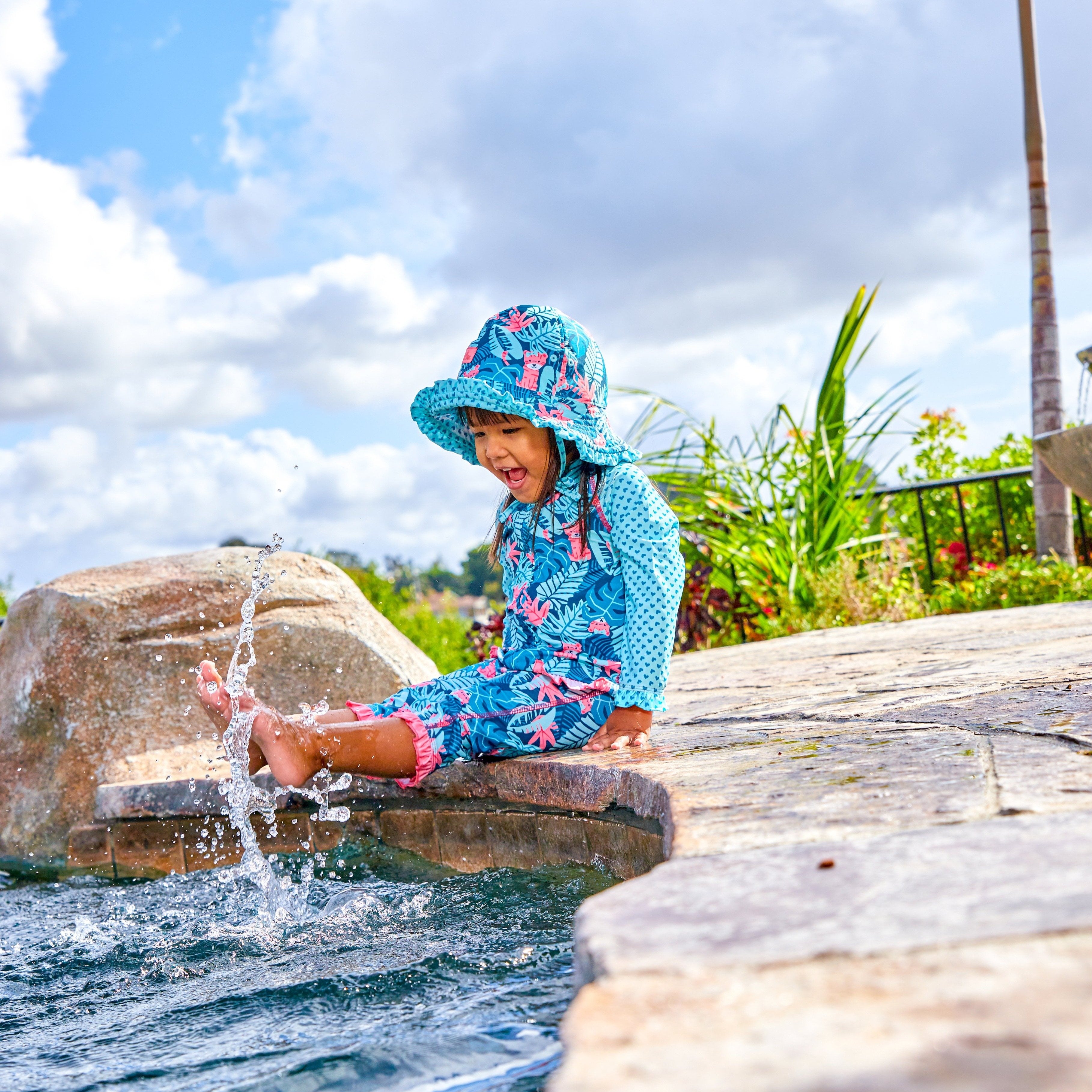 Little Girl in UV Skinz's Baby Girl's Reversible Sun Hat in Jungle Tiger|jungle-tiger