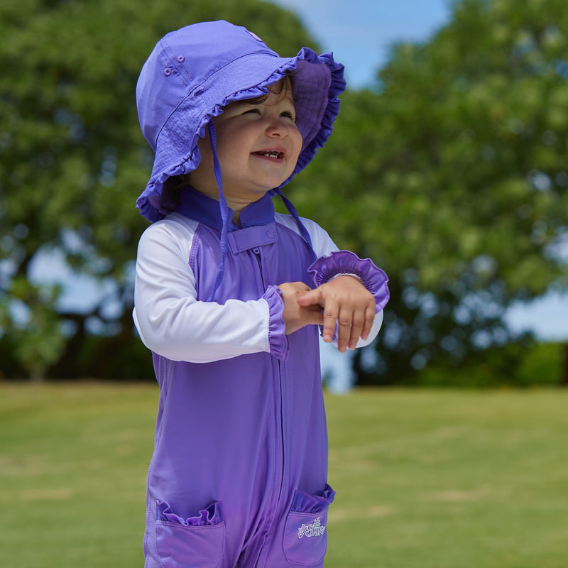 Baby girl in UV Skinz's baby girl's reversible sun hat in purple misty purple|purple-misty-purple