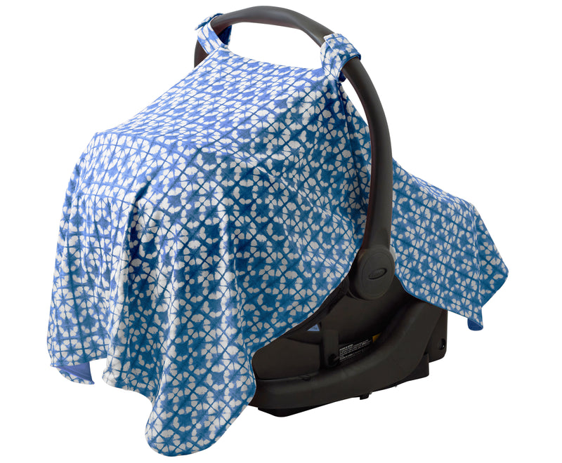 Side view of the Sun protective car seat cover for babies in tie dyed blues|tie-dyed-blues