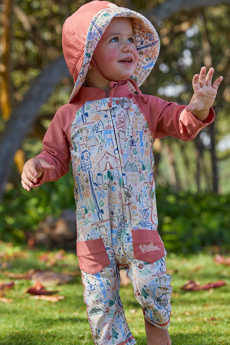 Baby boy wearing UV Skinz's boy's long-sleeve swimsuit in campfire doodle|campfire-doodle