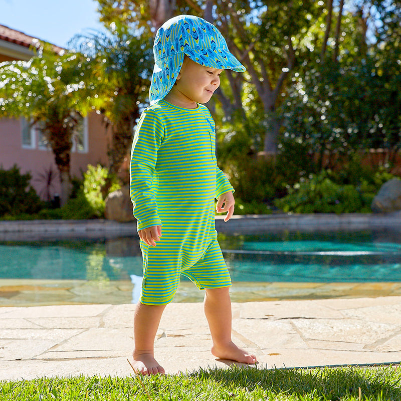 Little boy in UV Skinz's baby boy's UV onesie in lime punch gator|lime-punch-gator