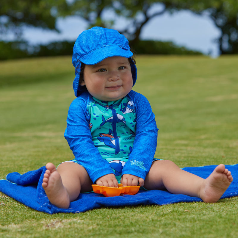 Baby boy in UV Skinz's baby boy's swim flap hat in surfing sharks jaspe|surfing-sharks-jaspe