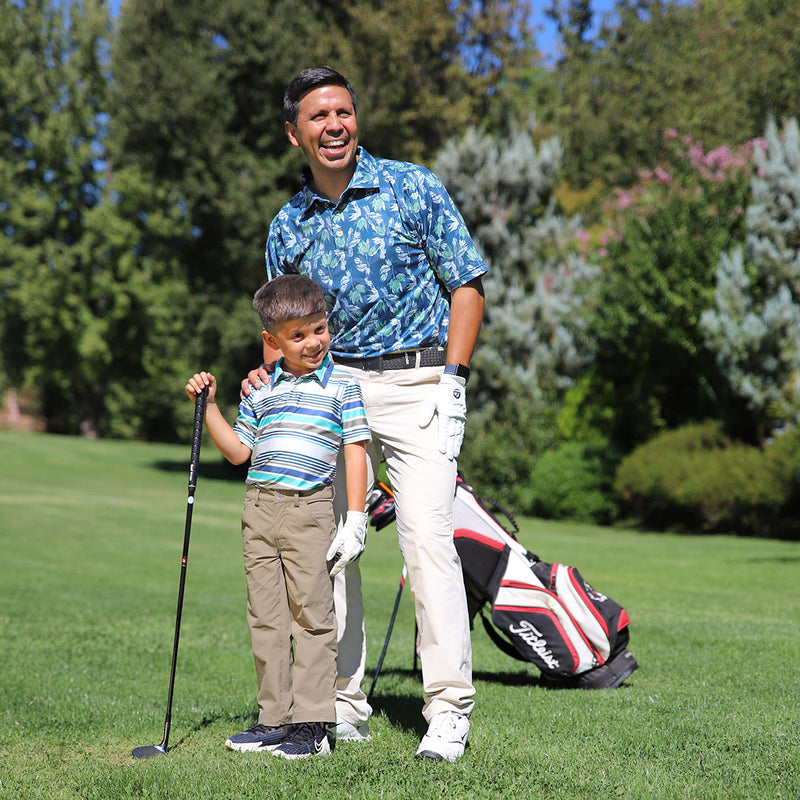 Dad golfing in UV Skinz's men's short sleeve polo in vintage tropical|vintage-tropical