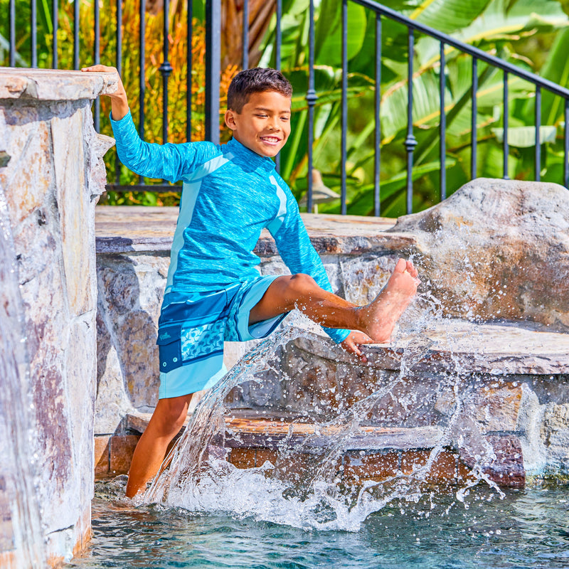 Boy Playing in UV Skinz's Boy's Long Sleeve Active Sun & Swim Shirt in Caribbean Jaspe|caribbean-jaspe