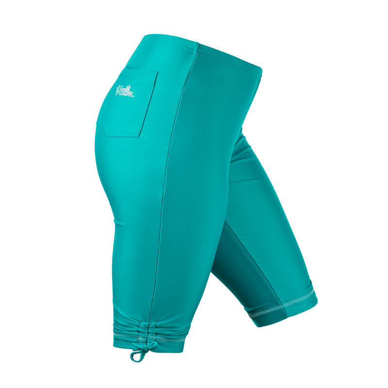 side view of the women's long swim shorts in teal|teal