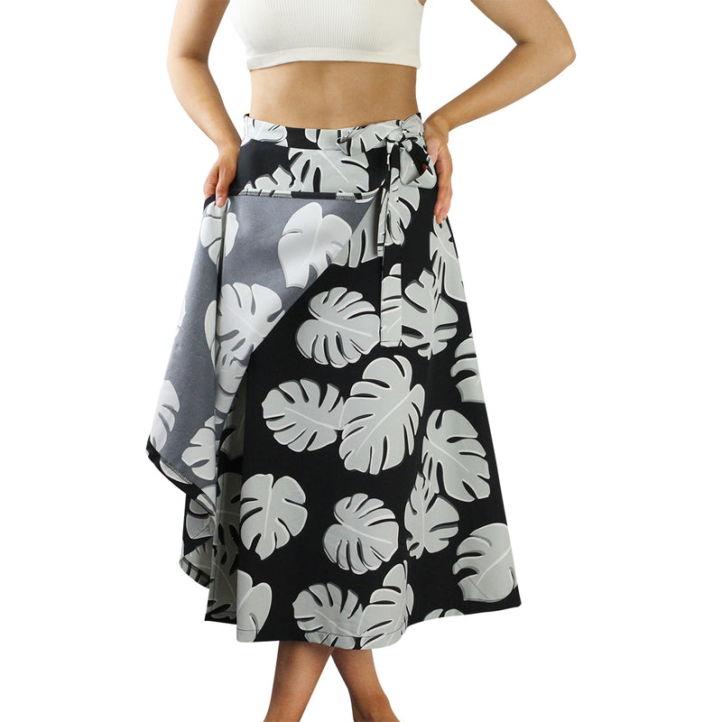 Woman in Women's Wrap Skirt in Black Flora|black-flora