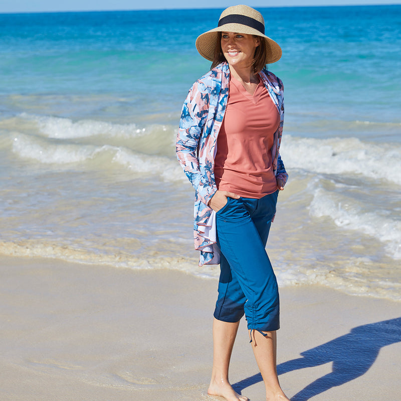 Woman in a Sun Hat on the Beach in UV Skinz's Women's Beach Capris|midnight