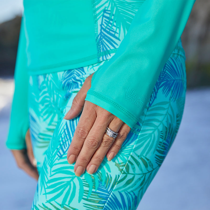 Close Up of the Sleeves on the Women's Active Swim Shrug in Turquoise|turquoise