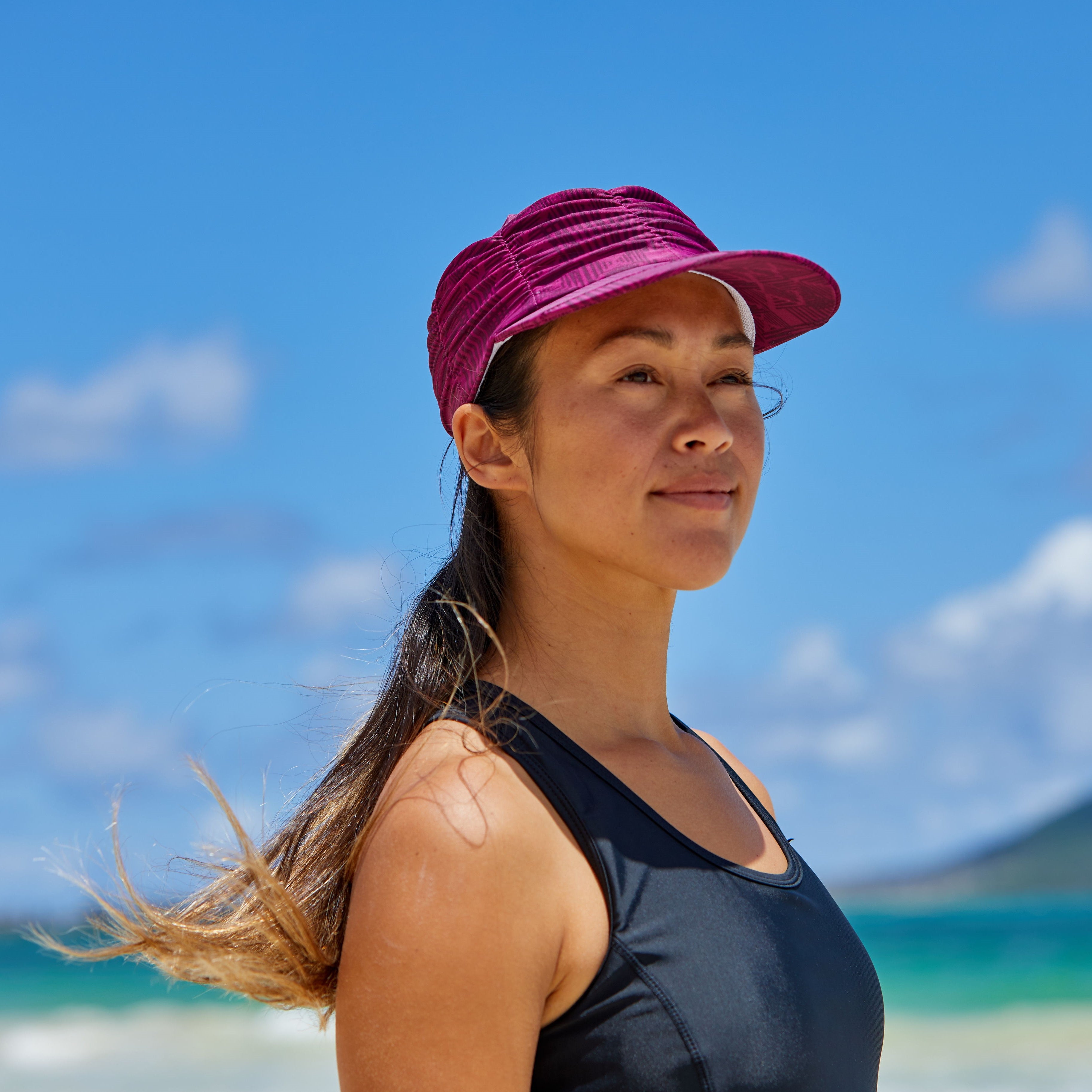 Woman Wearing UV Skinz's Women's Ruched Sun Cap in Wine Lattice|wine-lattice