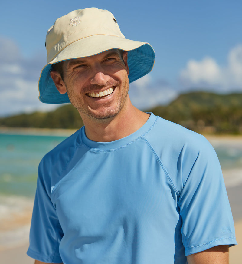 Man at the Beach in  Men's Bucket Hat in Sky Blue Cream|sky-blue-cream