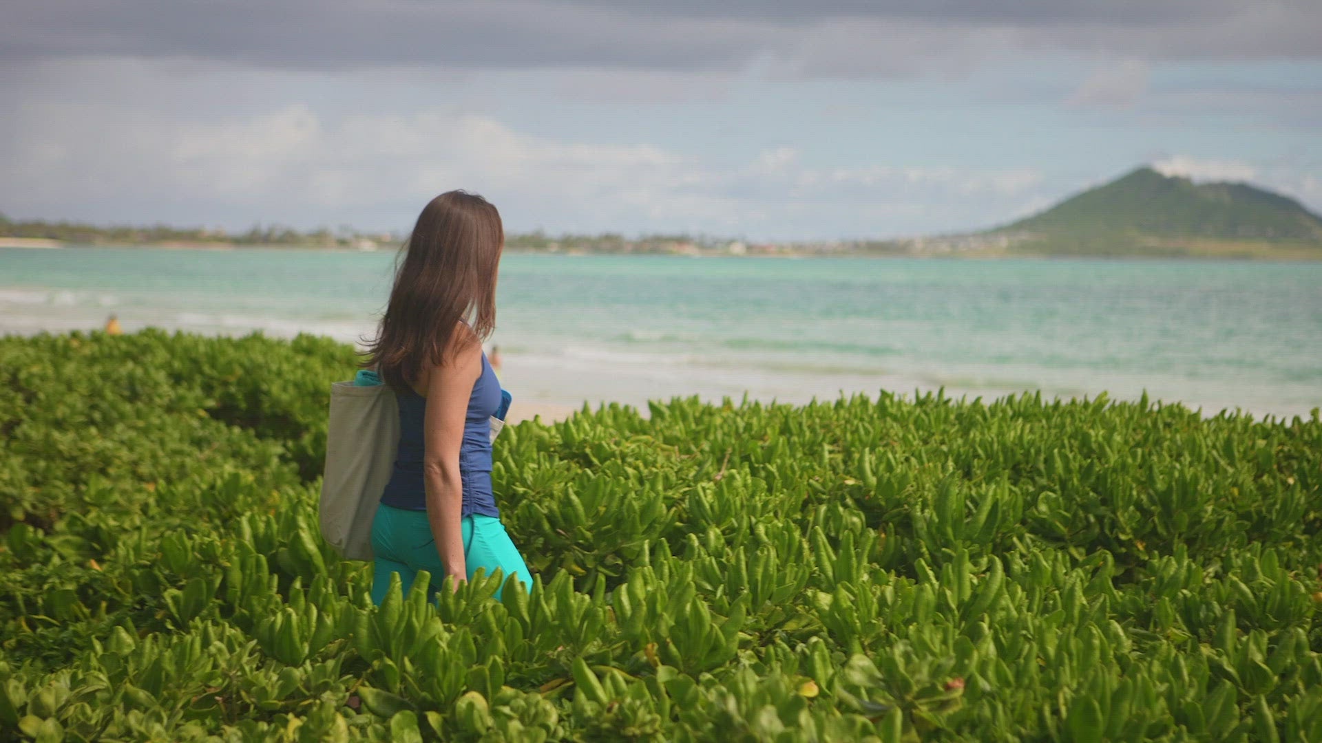woman in UV Skinz's long swim shorts