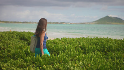 woman in UV Skinz's long swim shorts