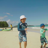 Kids playing in UV Skinz's adjustable sun hat 
