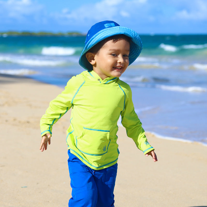 Boy wearing UV Skinz's boy's bucket hat in navy blue ocean|navy-blue-ocean-blue