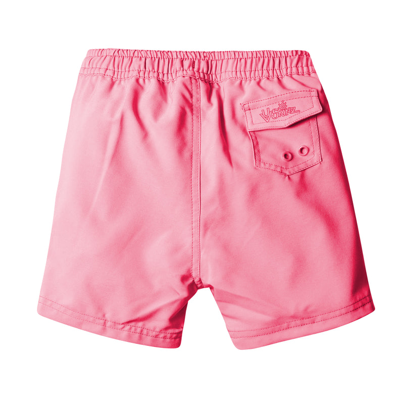 back view of the girl's board shorts in bubblegum|bubblegum