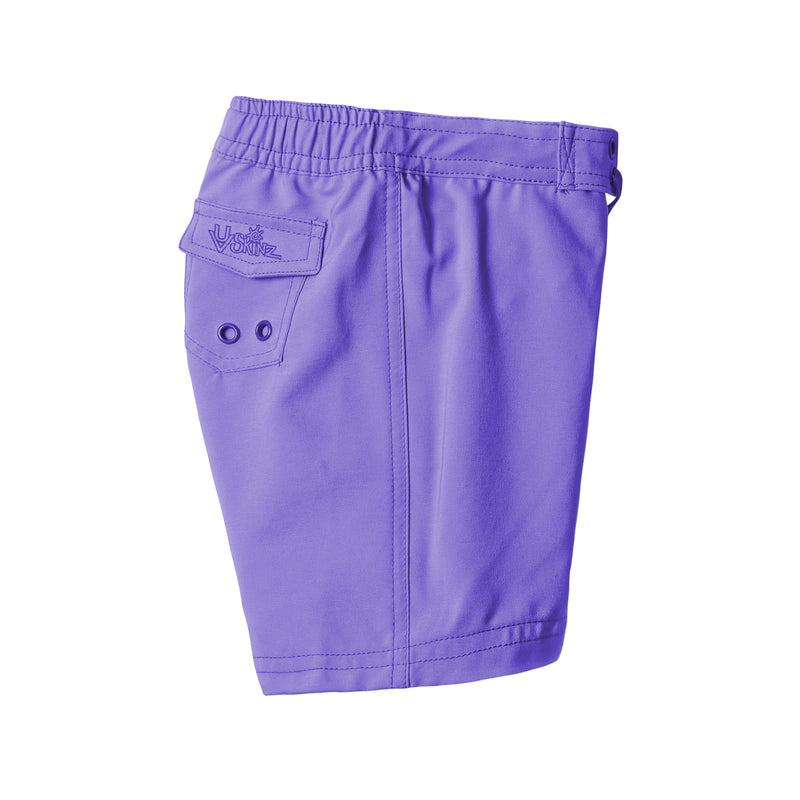 side view of the girl's board shorts in purple|purple