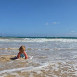 Baby Boy Playing at the Beach in Baby Boys' Long Sleeve Swim Romper
